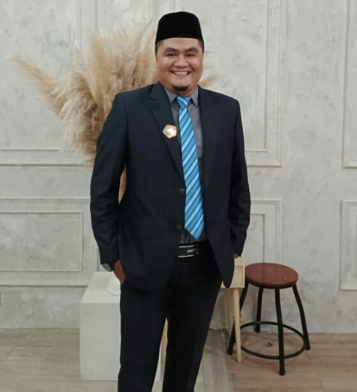 Dr. Syaflin Halim, M.A